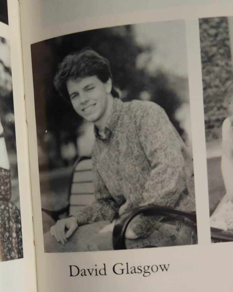 David's senior college yearbook photo. And boy. That hair.